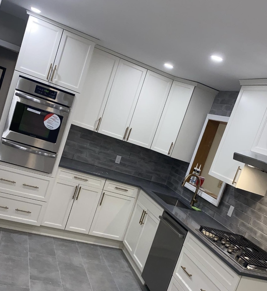 Bright shaker kitchen with quartz counters after remodel in Parlin, NJ